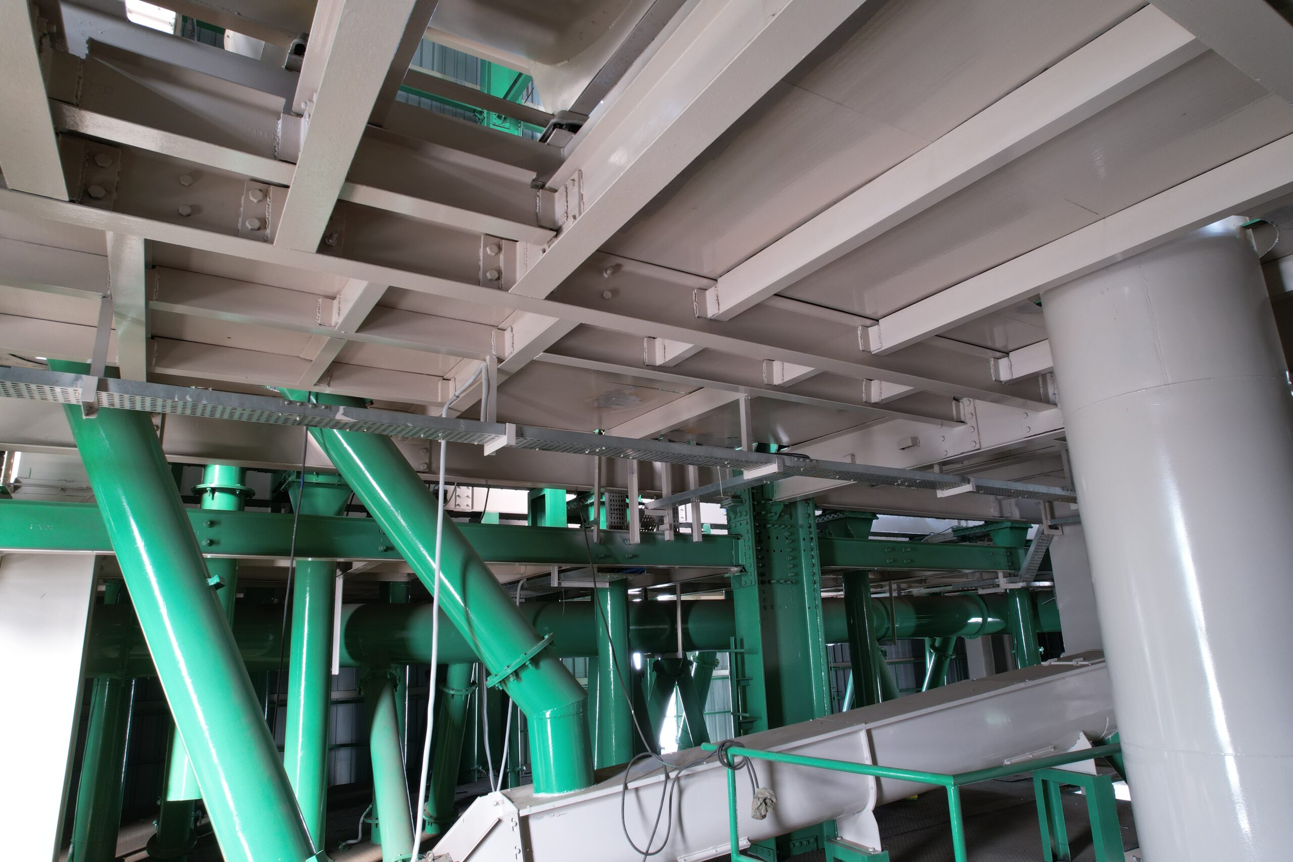 Bucket elevators and conveying towers